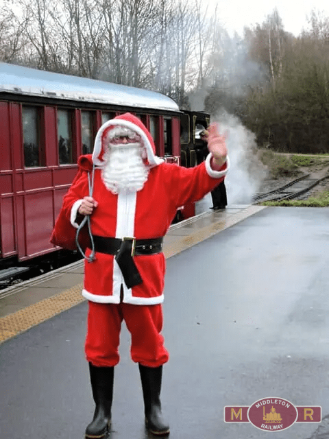 Santa waving from platform